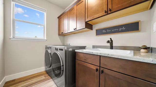 a utility room with cabinets