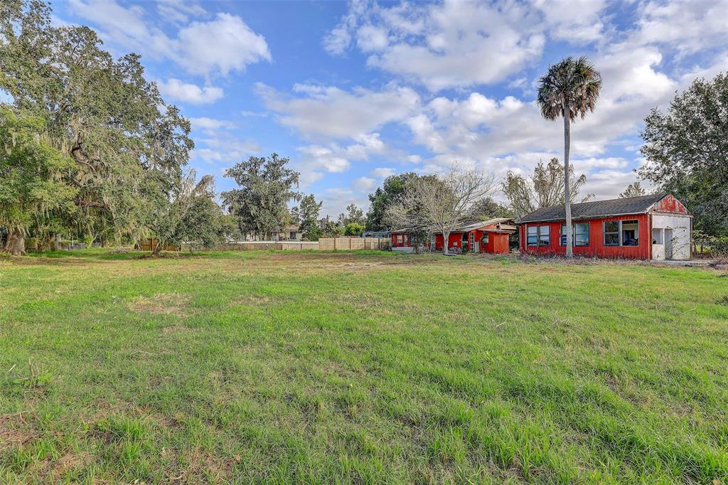 3510 Moores Lake Road Dover, FL 33527 - Photo 4 of 16 a view of outdoor space with deck and green space