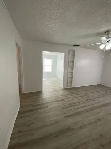 a view of an empty room and window