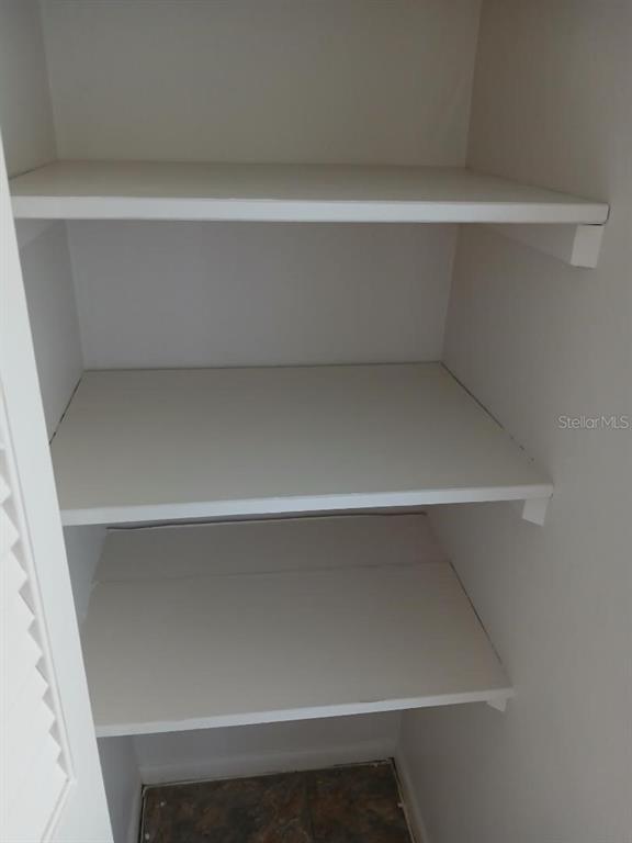 1433 South Belcher Road, Unit F5 Clearwater, FL 33764 - Photo 12 of 18 a close view of closet