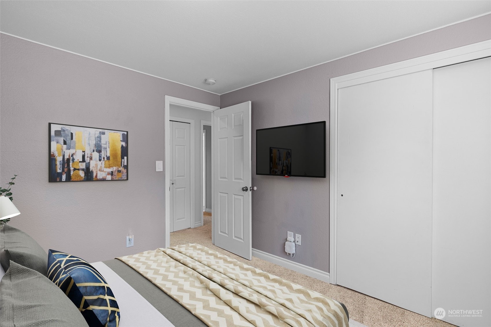 10823 23rd Drive Southeast Everett, WA 98208 - Photo 23 of 39 a bedroom with a bed and a television