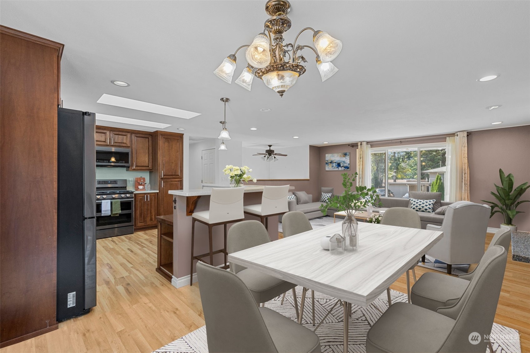 10823 23rd Drive Southeast Everett, WA 98208 - Photo 7 of 39 a view of a dining room with furniture and chandelier