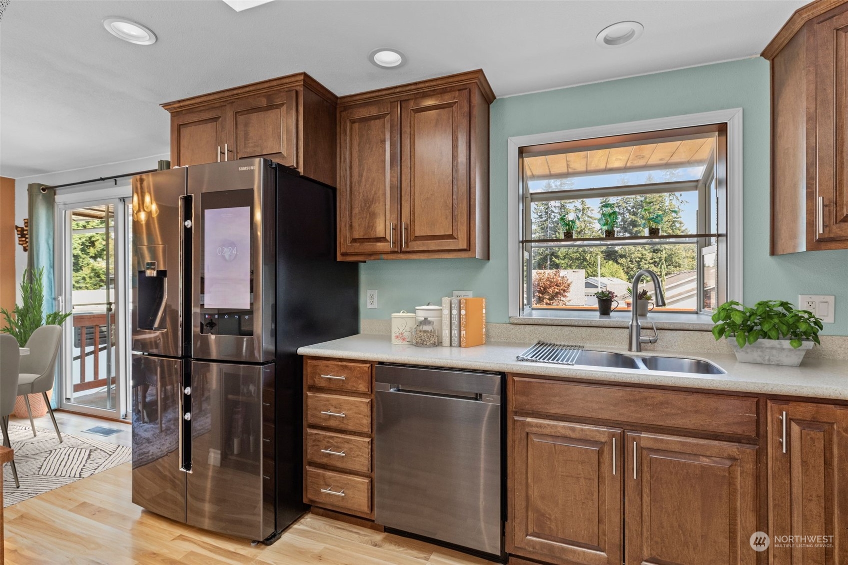 10823 23rd Drive Southeast Everett, WA 98208 - Photo 9 of 39 a kitchen with stainless steel appliances granite countertop a refrigerator and a sink