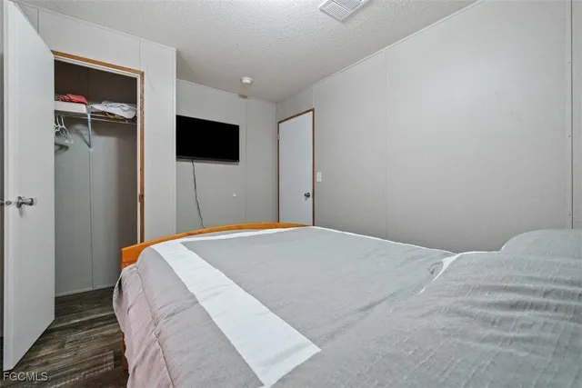a view of front door with wooden floor