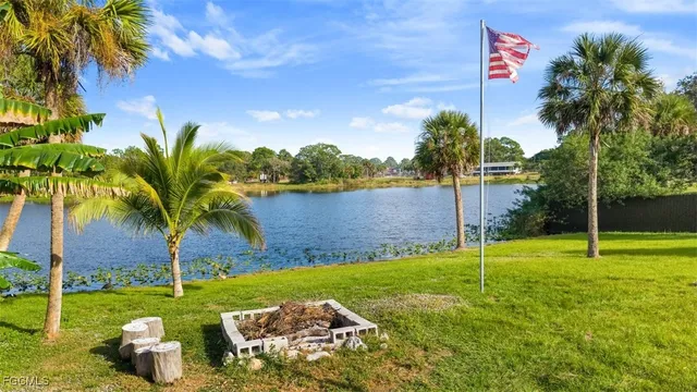a view of a chairs and table in a yard