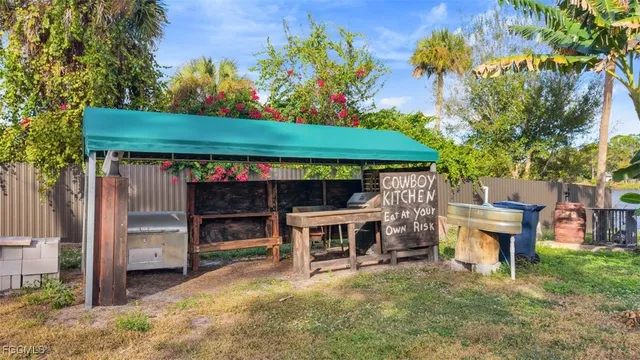 a backyard of a house with lots of green space
