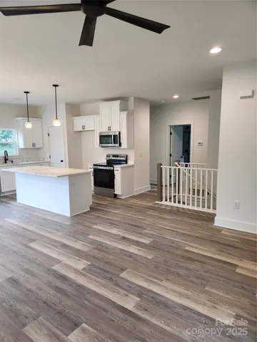 a view of kitchen and microwave