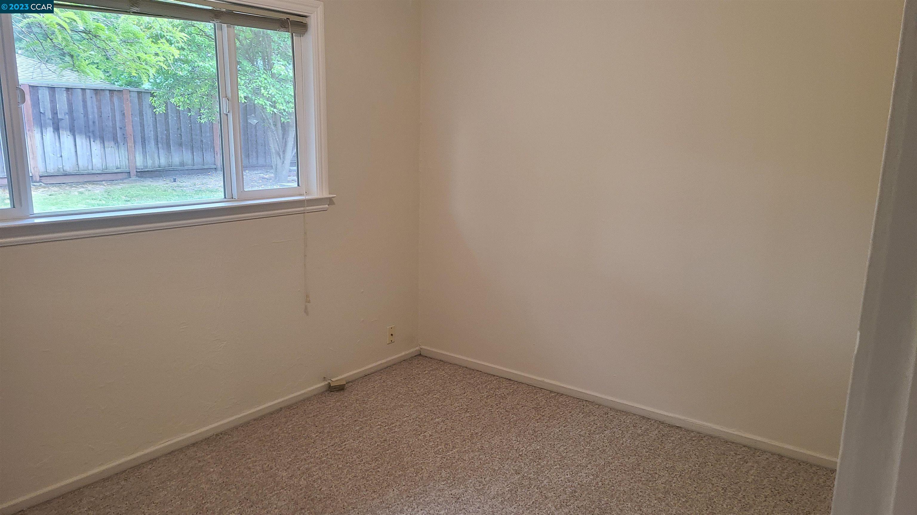 249 Evelyn Drive Pleasant Hill, CA 94523 - Photo 15 of 18 an empty room with a window