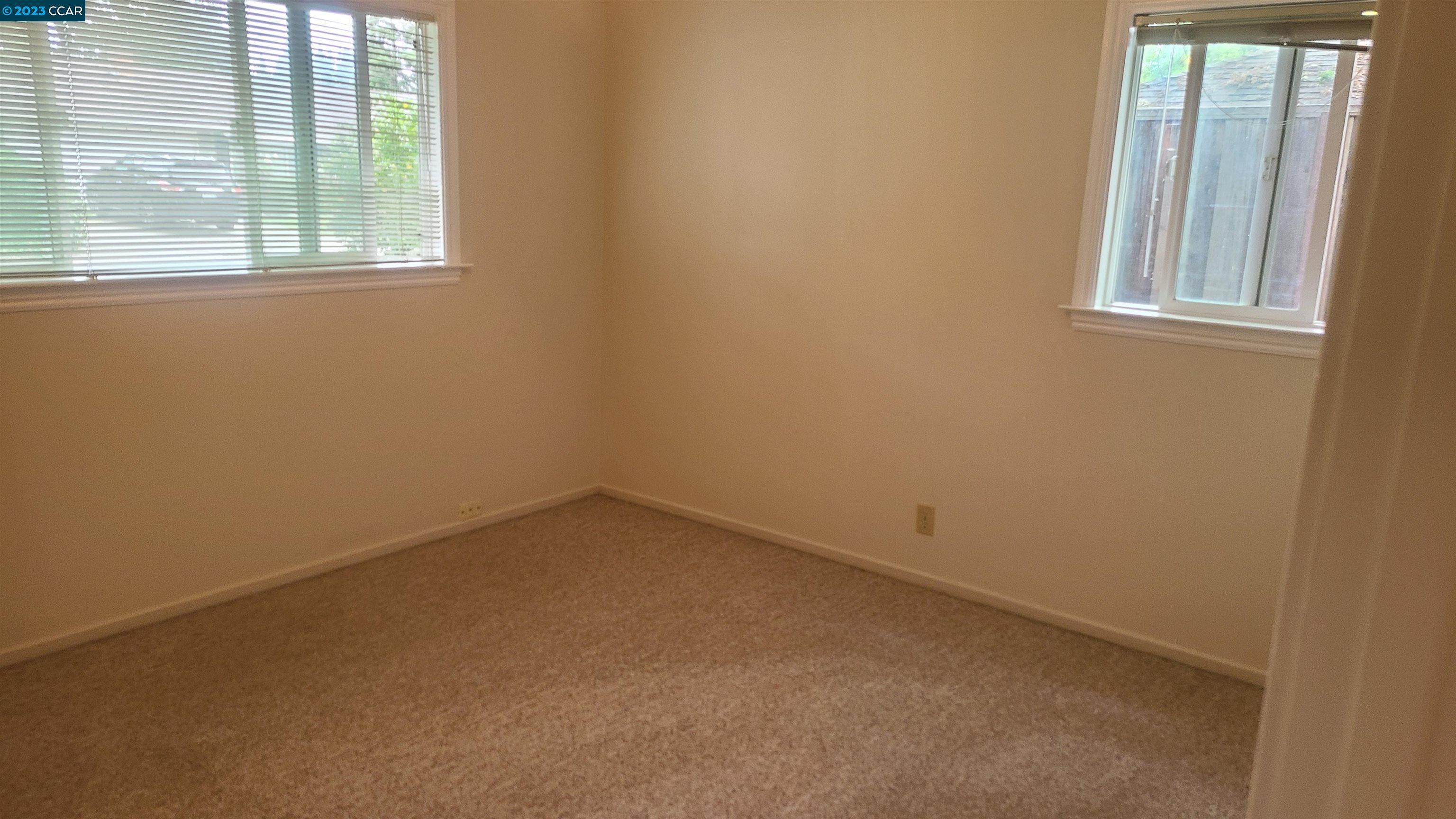 249 Evelyn Drive Pleasant Hill, CA 94523 - Photo 17 of 18 an empty room with a window