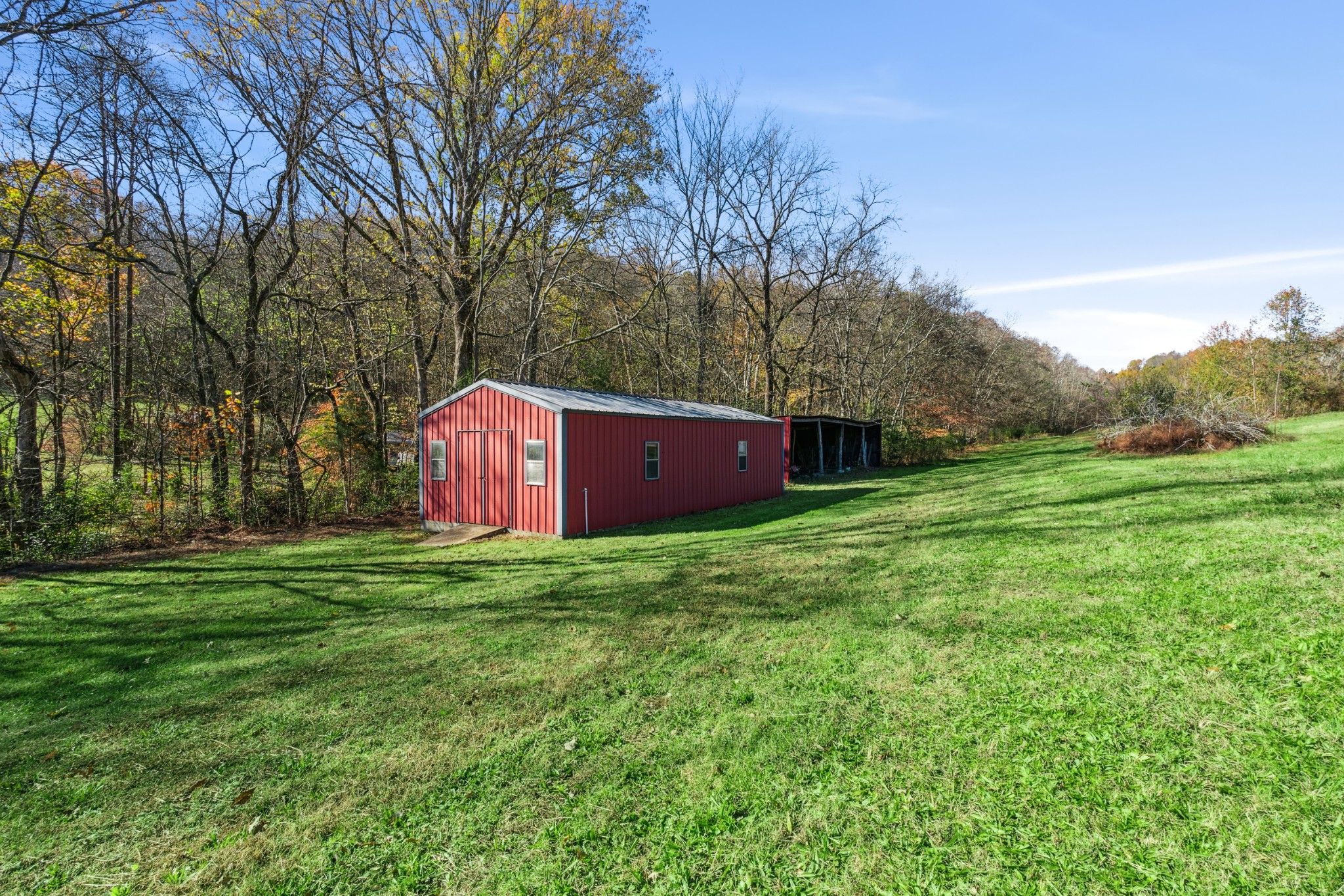 2621 Knob Creek Road Columbia, TN 38401 - Photo 5 of 9 a view of a backyard with large trees
