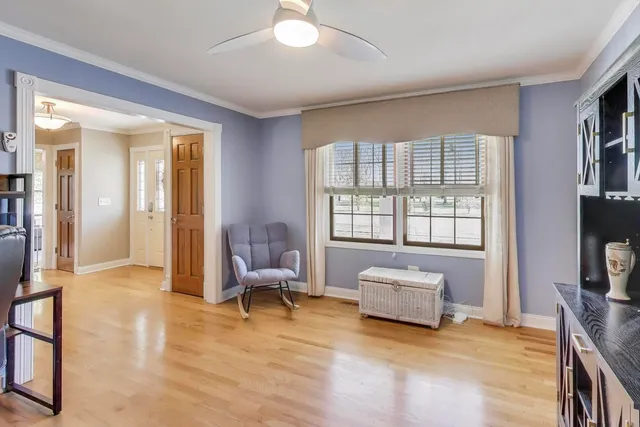 a kitchen with granite countertop a sink a counter top space stainless steel appliances and cabinets