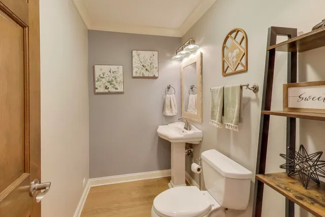 a utility room with sink dryer and washer