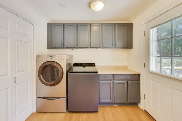 a bedroom with a bed and a table