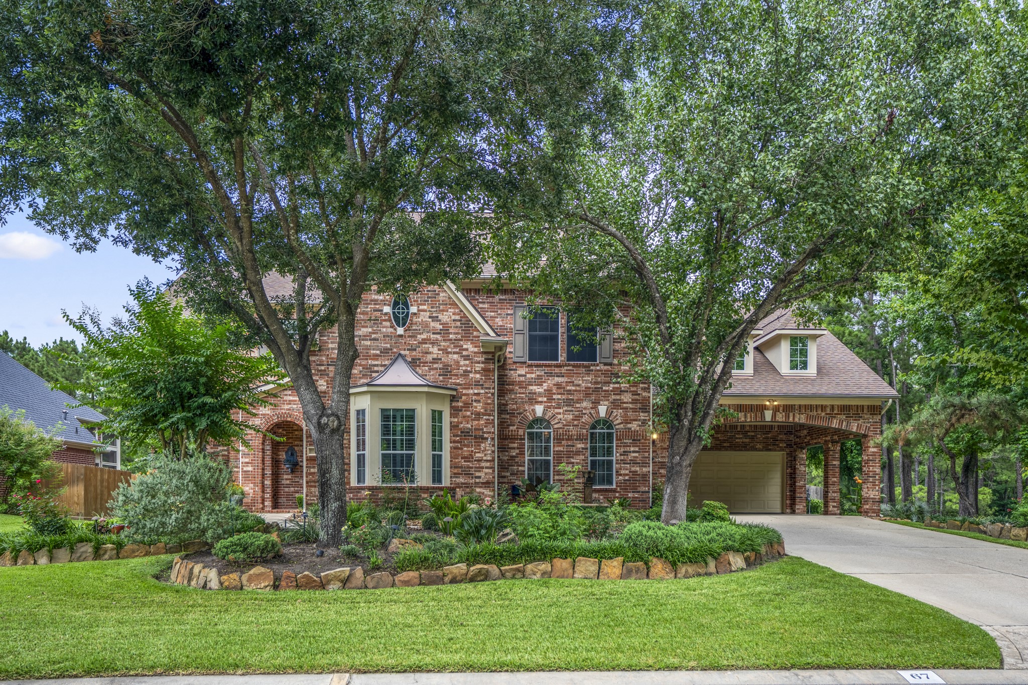 67 North Pentenwell Circle Spring, TX 77382 - Photo 1 of 50 front view of house with a yard