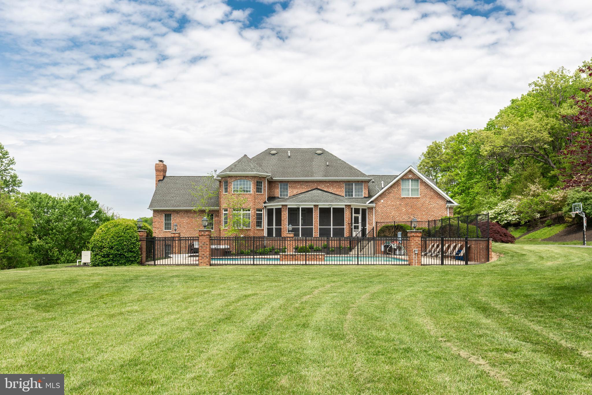 2995 Sams Creek Road New Windsor, MD 21776 - Photo 16 of 126 a front view of a house with a yard table and chairs