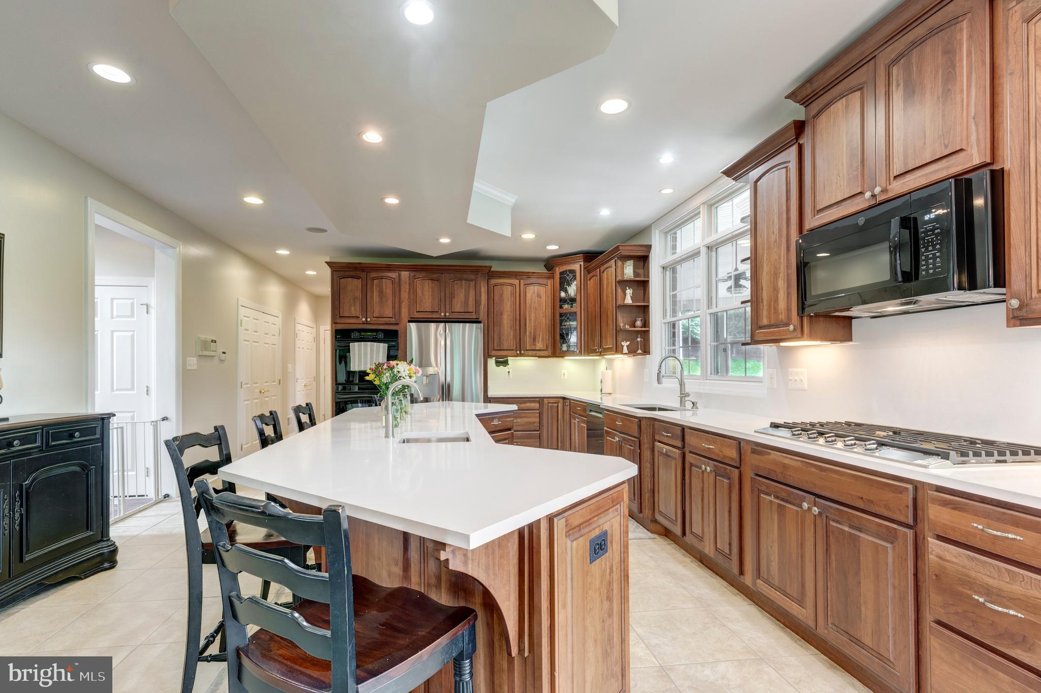 2995 Sams Creek Road New Windsor, MD 21776 - Photo 46 of 126 rich cabinetry and new Silestone countertops