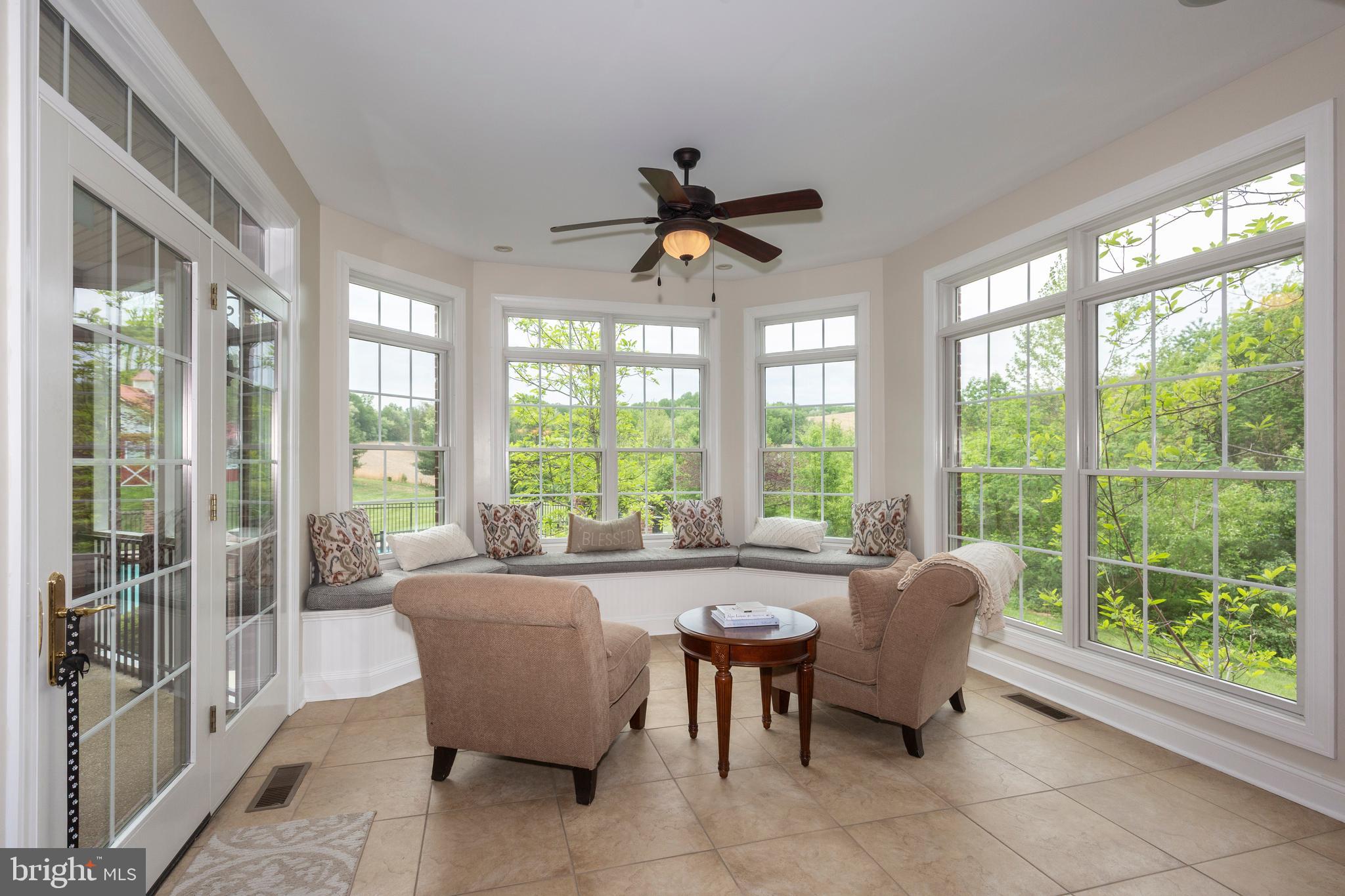 2995 Sams Creek Road New Windsor, MD 21776 - Photo 57 of 126 Sunroom w/built-in seating offers panoramic views
