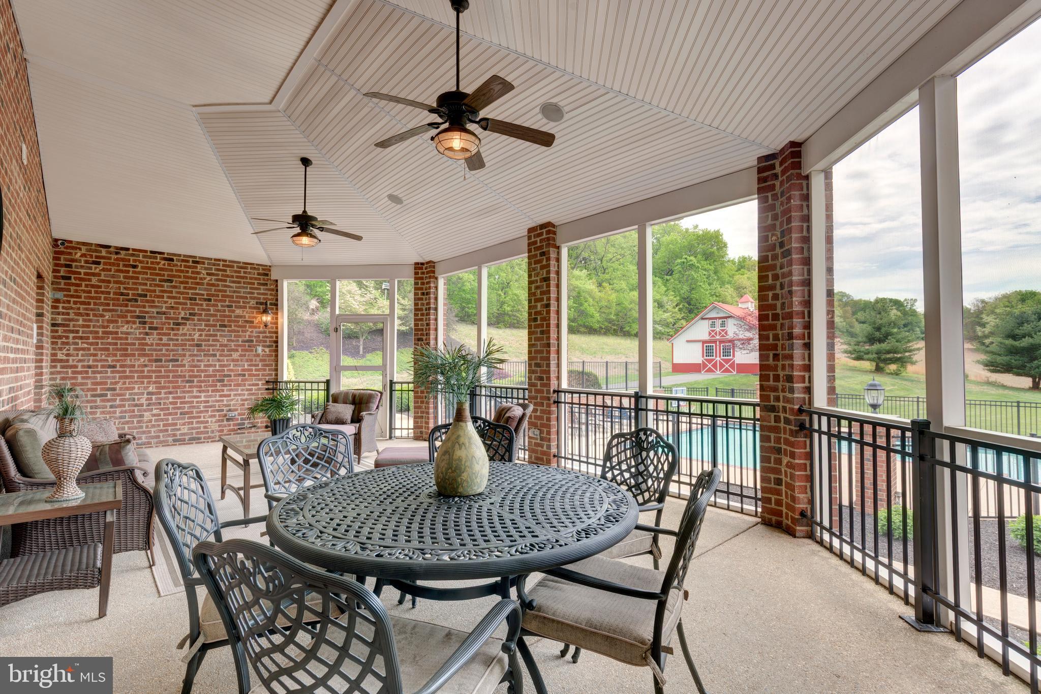 2995 Sams Creek Road New Windsor, MD 21776 - Photo 62 of 126 Covered rear porch overlooking the pool area