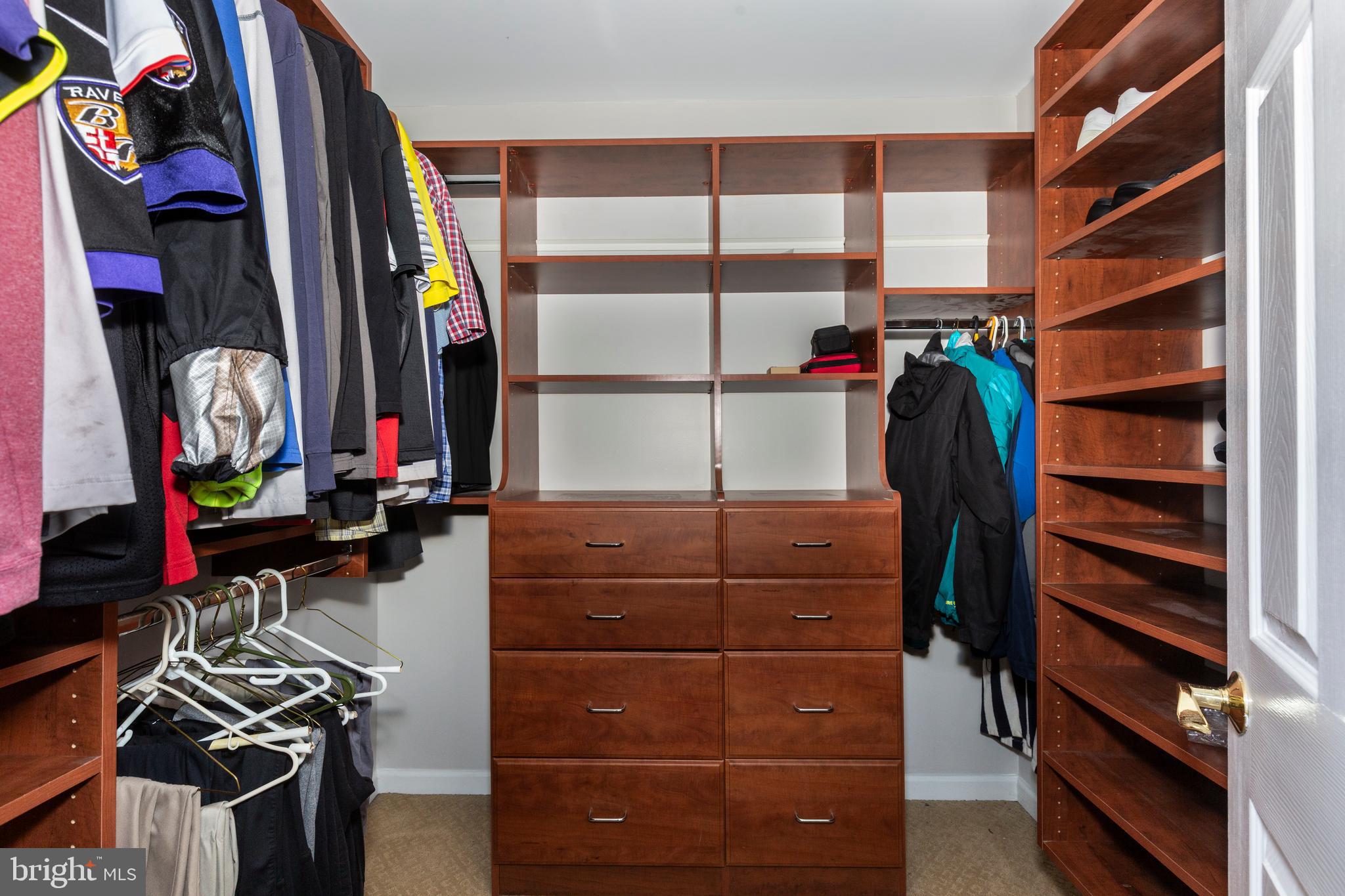 2995 Sams Creek Road New Windsor, MD 21776 - Photo 75 of 126 a view of walk in closet with clothes and shoes