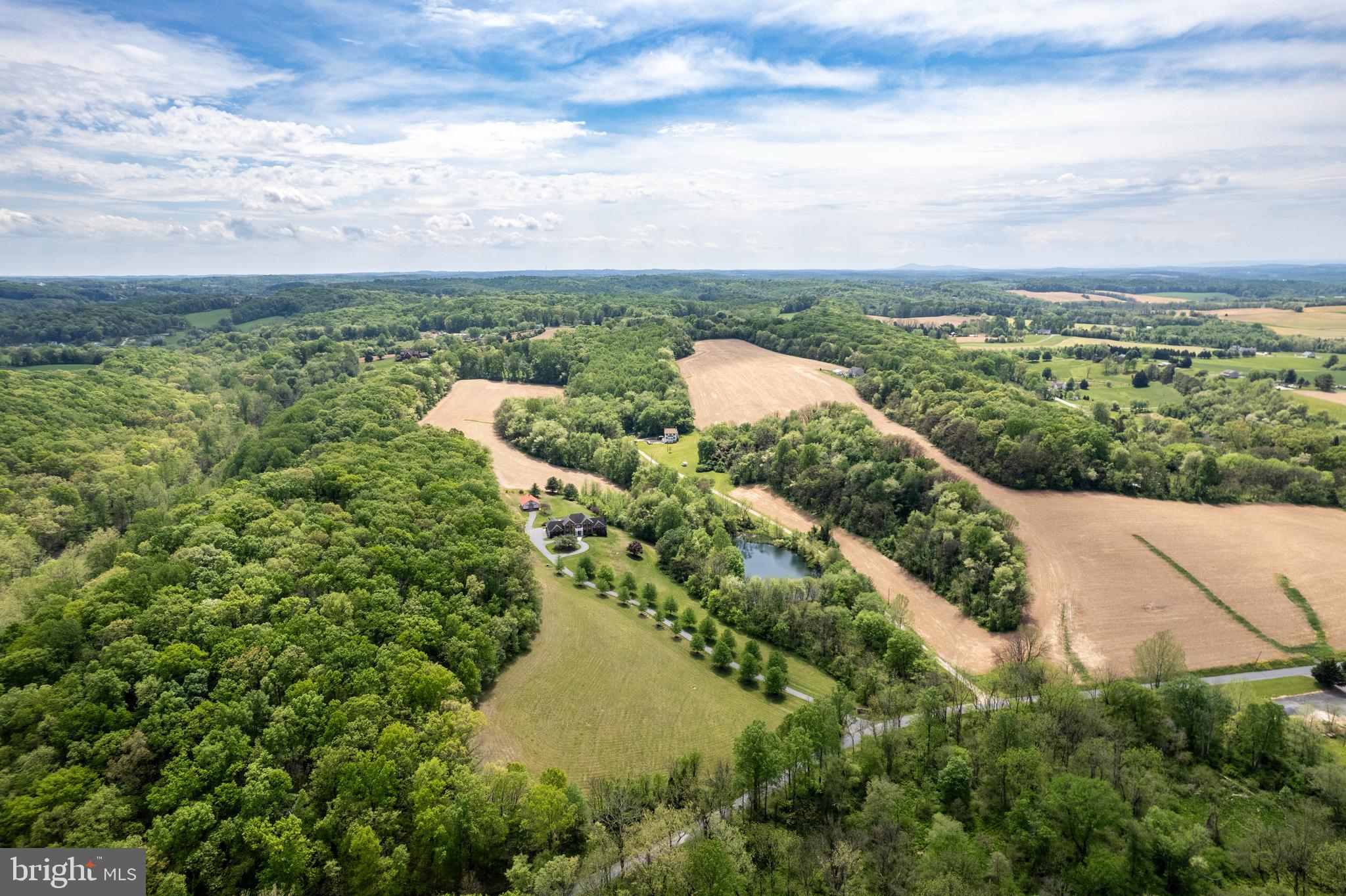 2995 Sams Creek Road New Windsor, MD 21776 - Photo 9 of 126 a view of a lake with a city view