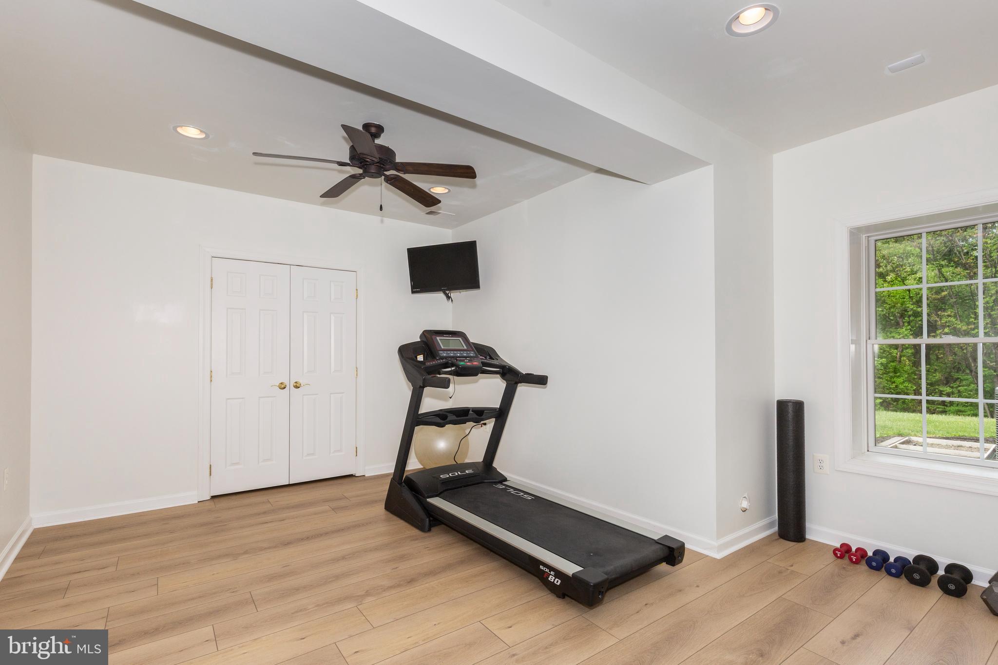 2995 Sams Creek Road New Windsor, MD 21776 - Photo 92 of 126 a view of a room with gym equipment