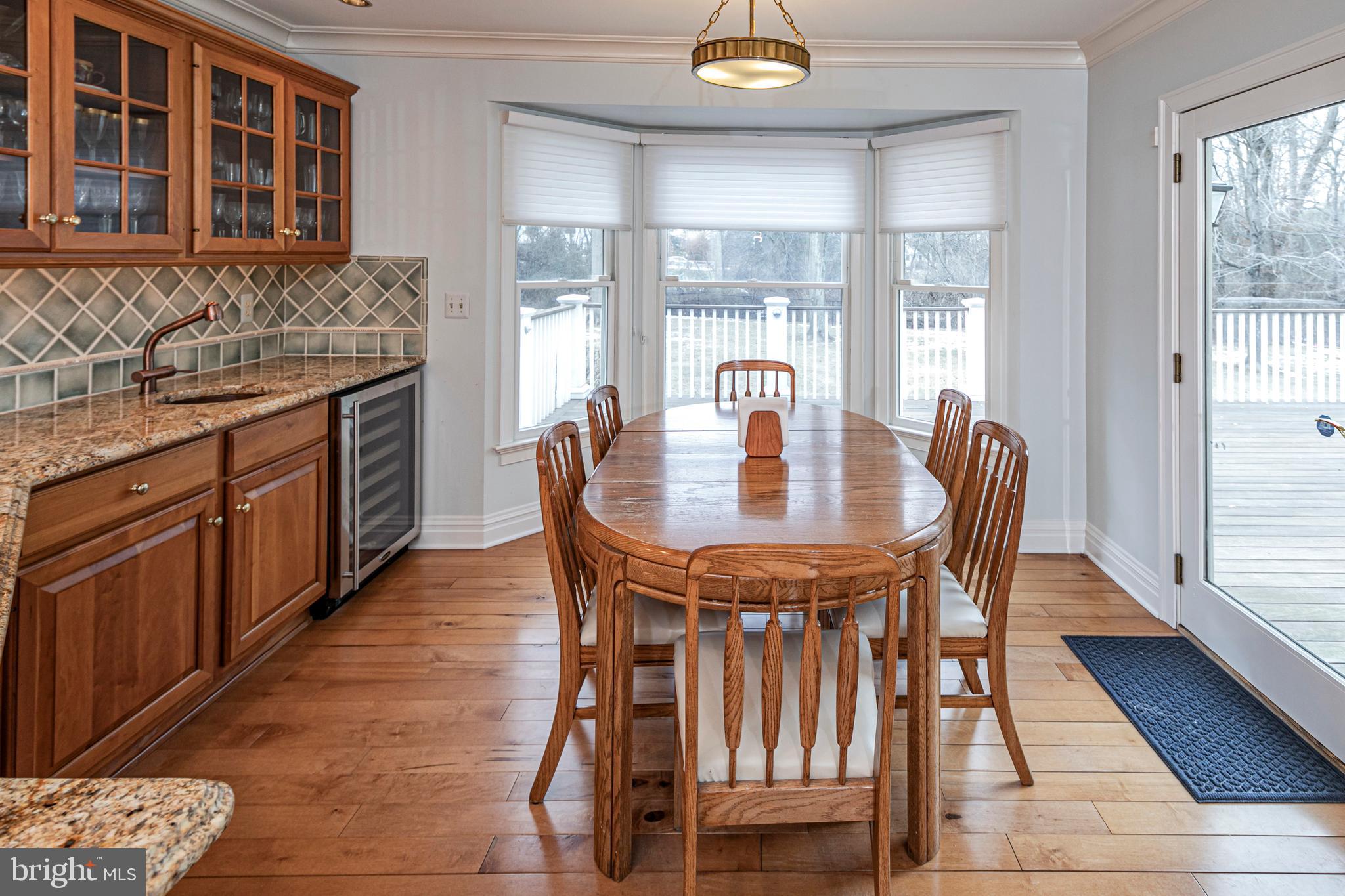 6 Nelson Ridge Road Princeton, NJ 08540 - Photo 18 of 41 a view of a dining room with furniture and wooden floor