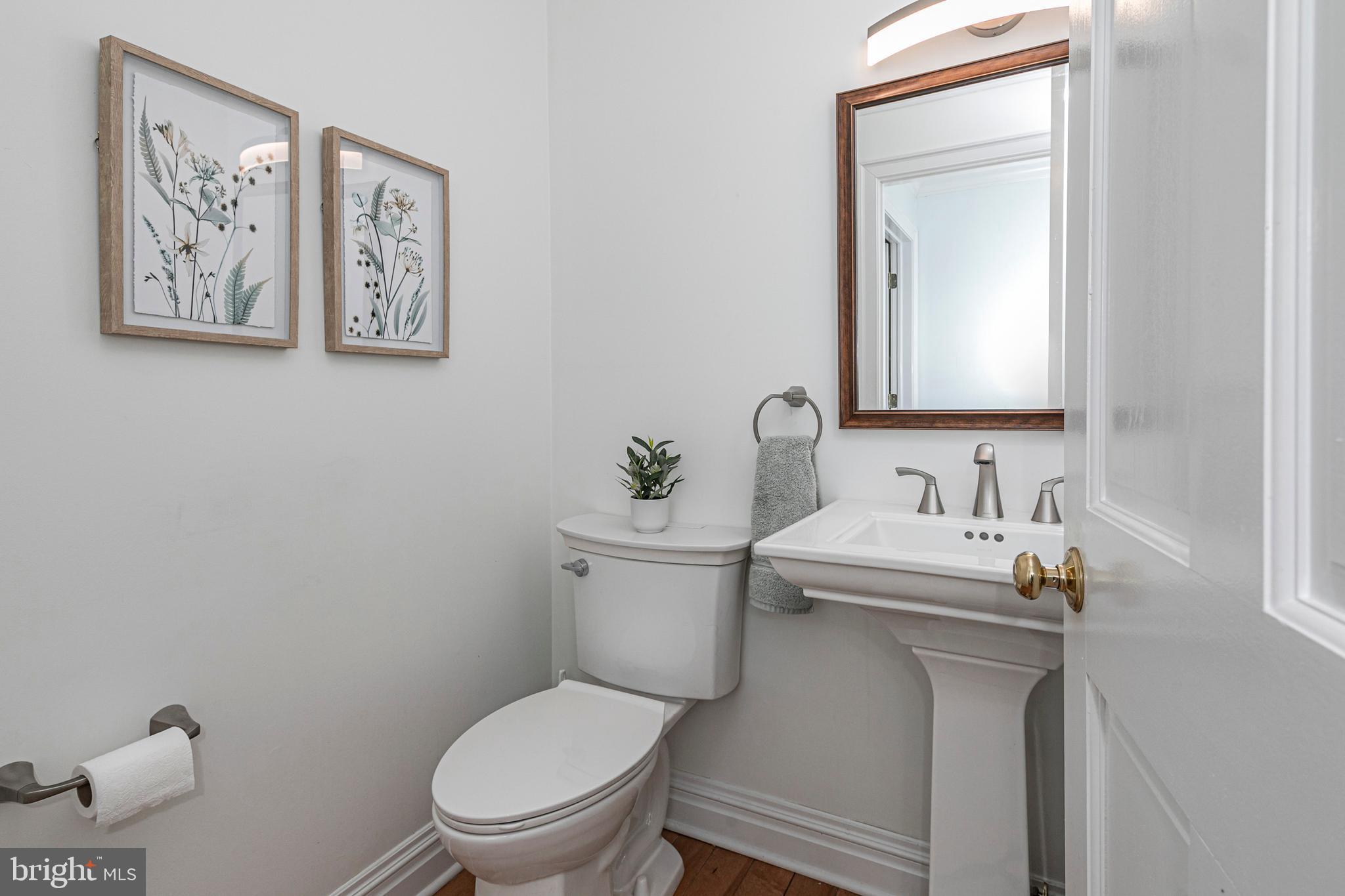 6 Nelson Ridge Road Princeton, NJ 08540 - Photo 22 of 41 a bathroom with a toilet a sink and mirror
