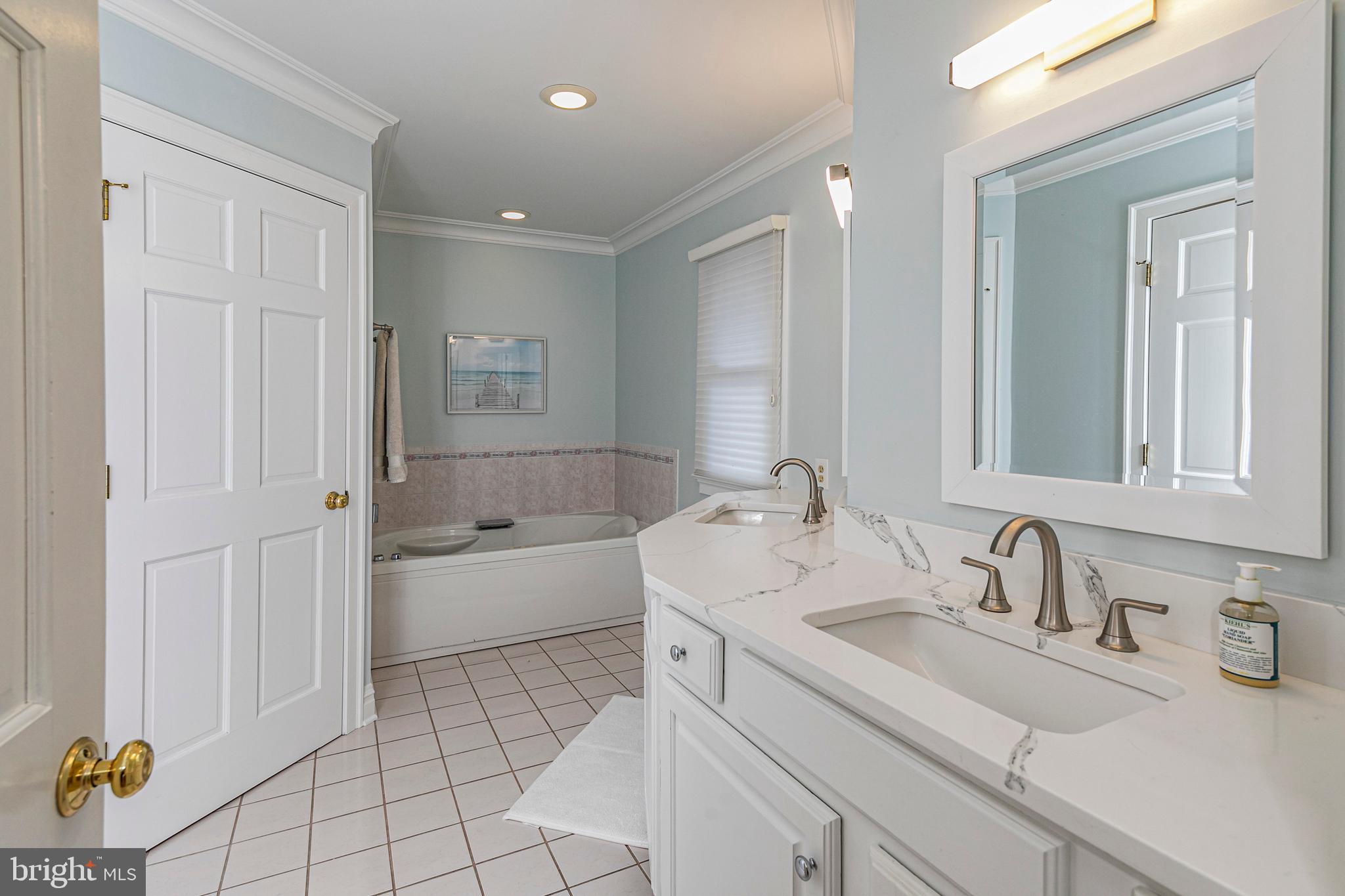 6 Nelson Ridge Road Princeton, NJ 08540 - Photo 27 of 41 a bathroom with a sink double vanity granite tub shower and a mirror