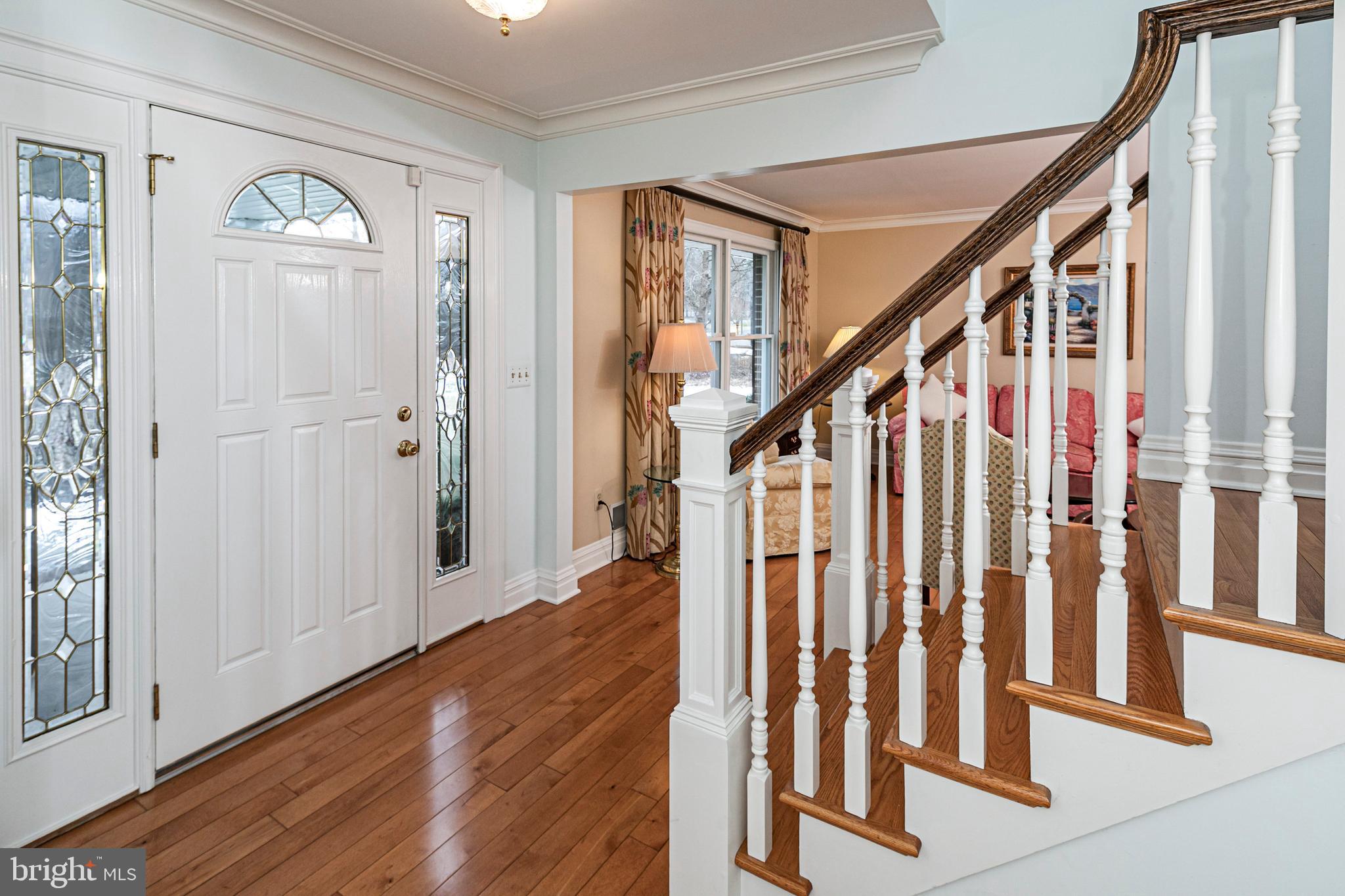 6 Nelson Ridge Road Princeton, NJ 08540 - Photo 3 of 41 a view of an entryway with wooden floor and stairs