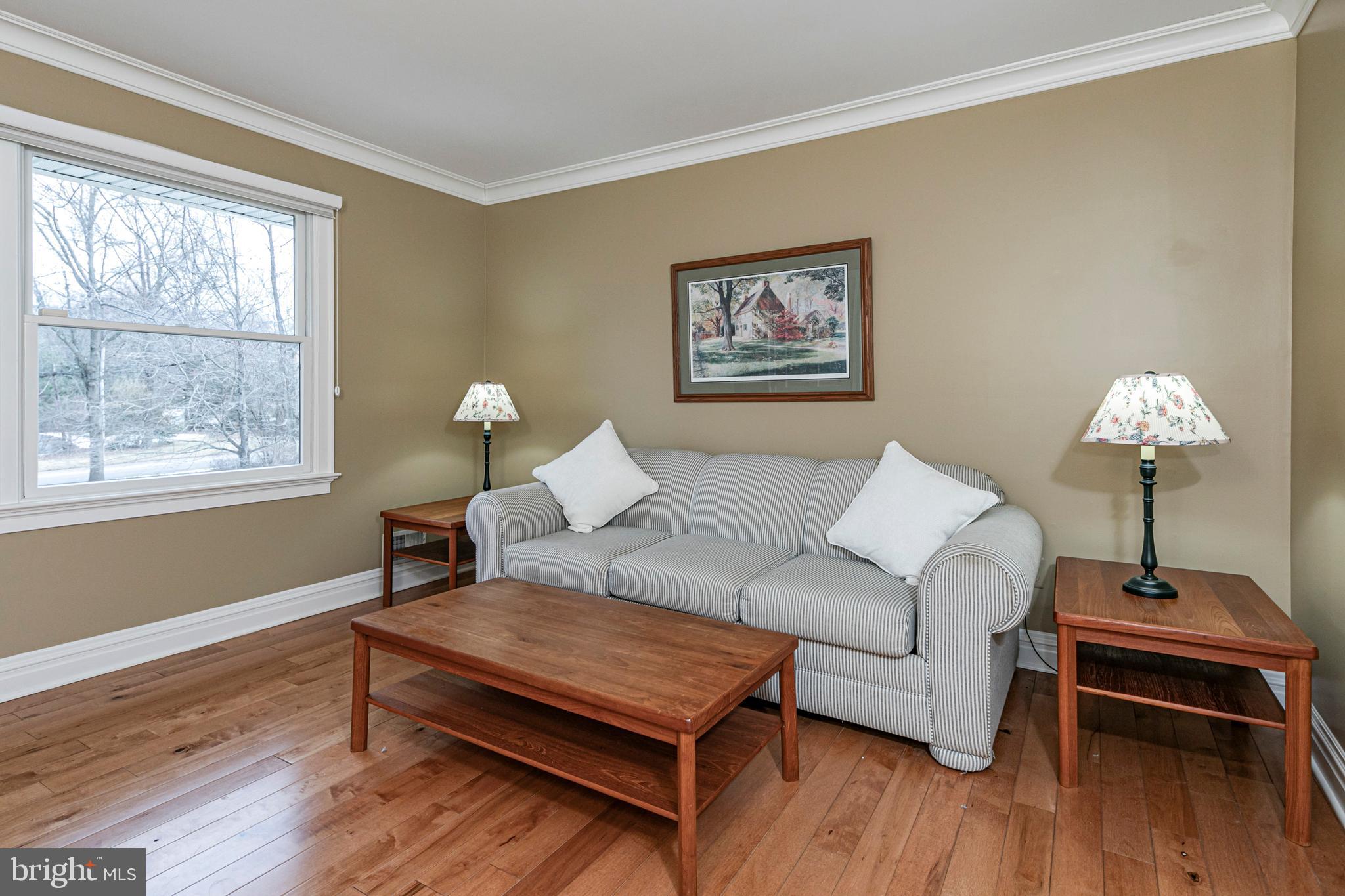 6 Nelson Ridge Road Princeton, NJ 08540 - Photo 31 of 41 a living room with furniture a table and a window