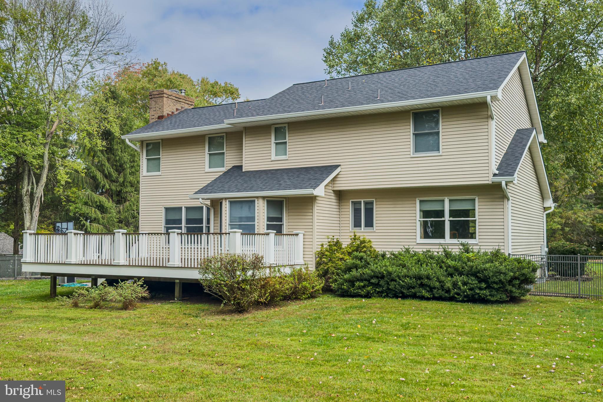 6 Nelson Ridge Road Princeton, NJ 08540 - Photo 34 of 41 a front view of a house with a garden