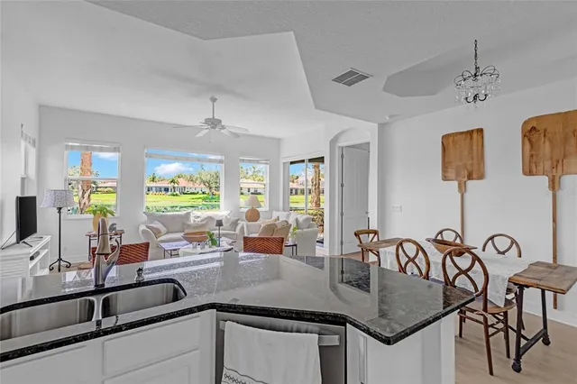 a work room with furniture and a window