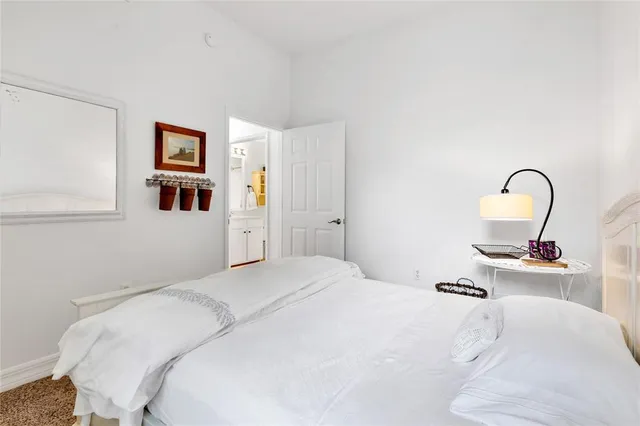 a balcony with furniture and a garden