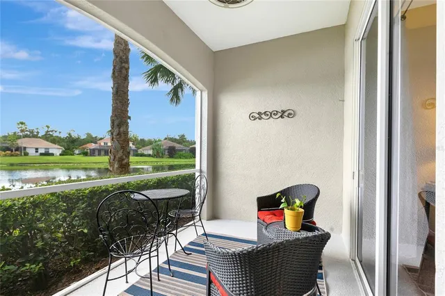 an aerial view of a houses with city view and lake view