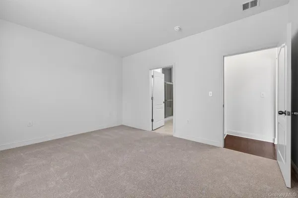 an empty room with an entryway