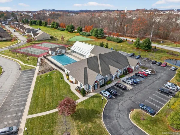 an aerial view of a house with outdoor space