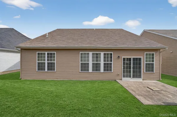 a view of a house that has a garden