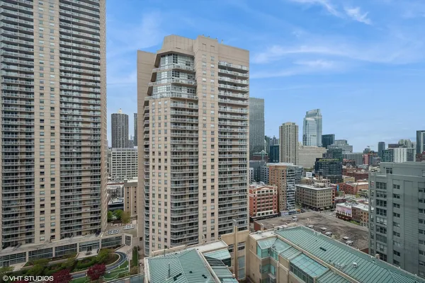 a view of a city with tall buildings