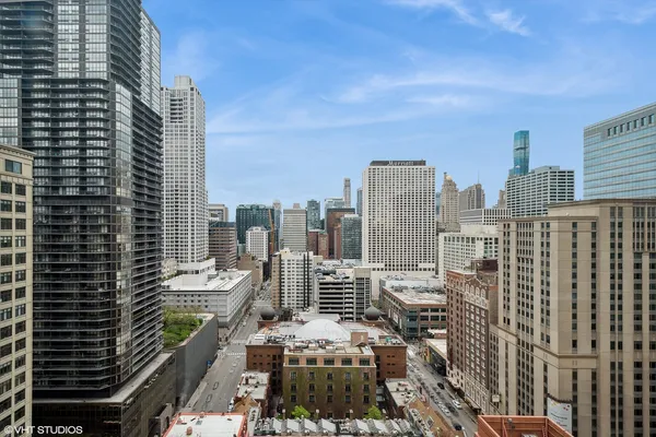 a view of a city with tall buildings