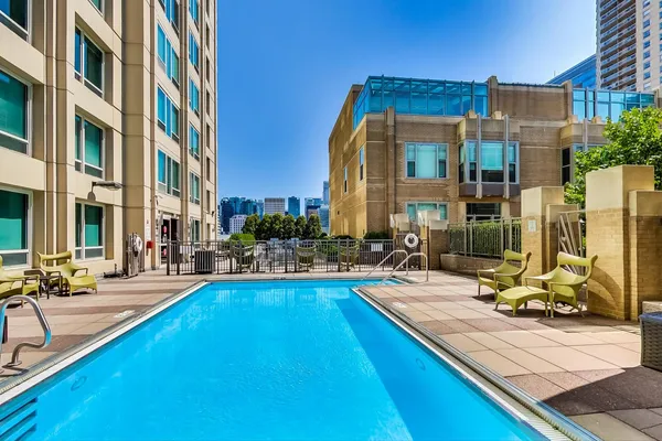 a view of a house with swimming pool