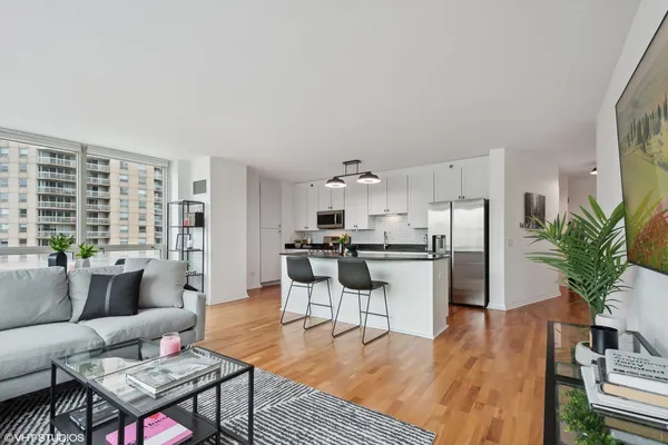 a living room with furniture and a table