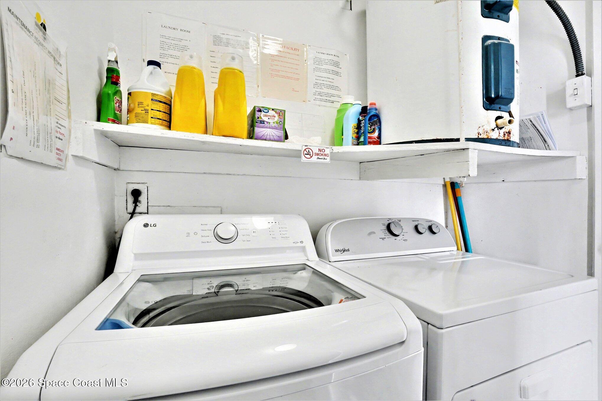 2727 North Wickham Road, Unit 20211 Melbourne, FL 32935 - Photo 14 of 18 Laundry Room Next To Unit
