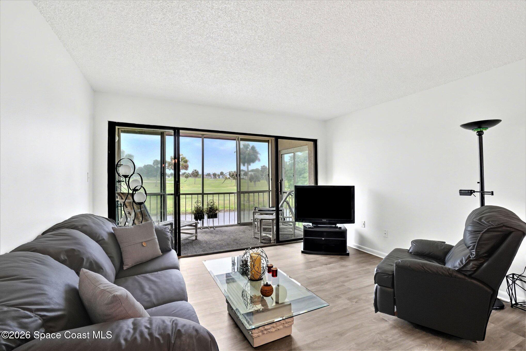 2727 North Wickham Road, Unit 20211 Melbourne, FL 32935 - Photo 2 of 18 Bright Living Spaces