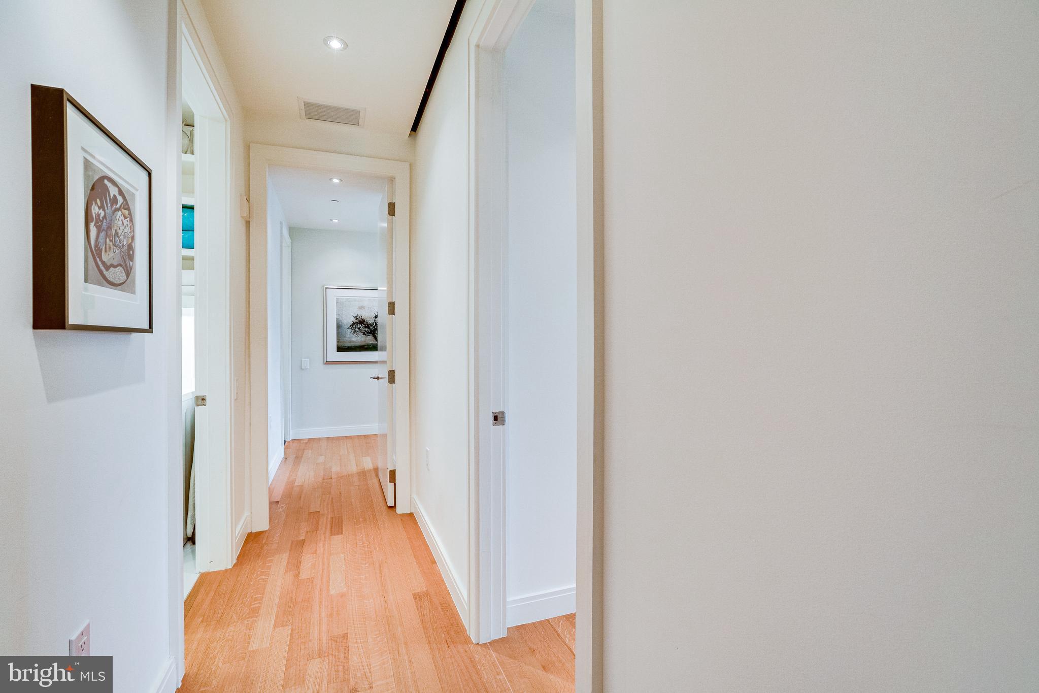 1177 22nd Street Northwest, Unit 7G Washington, DC 20037 - Photo 10 of 33 Hallway to bedrooms wing