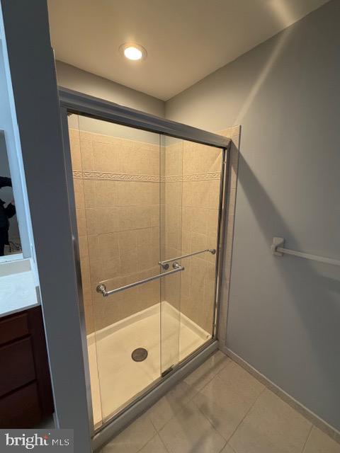 80 Brecknock Court Newtown, PA 18940 - Photo 14 of 22 a bathroom with a shower and a glass door