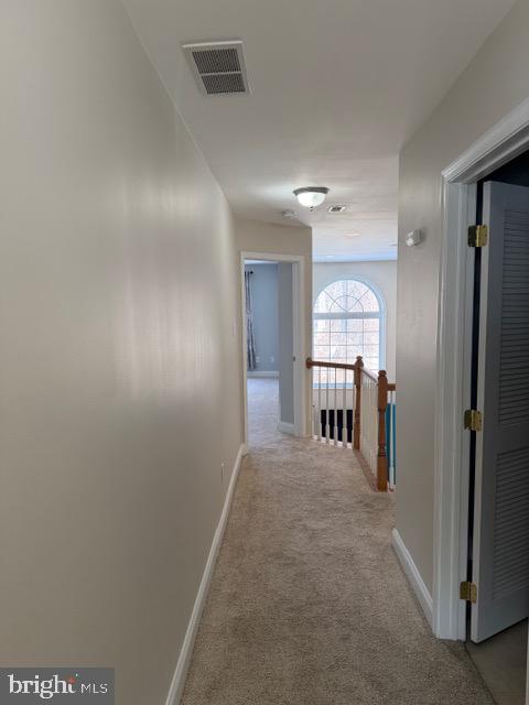 80 Brecknock Court Newtown, PA 18940 - Photo 18 of 22 a view of a hallway with wooden shelves