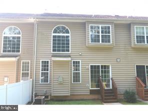 80 Brecknock Court Newtown, PA 18940 - Photo 21 of 22 a front view of a house with a outdoor space