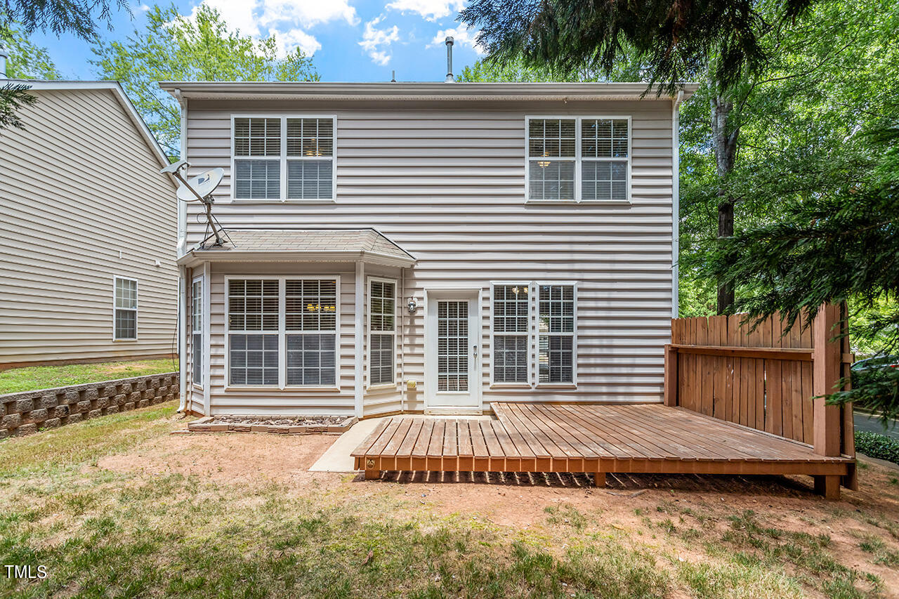 8403 Tie Stone Way Raleigh, NC 27613 - Photo 33 of 37 a house view with a outdoor space