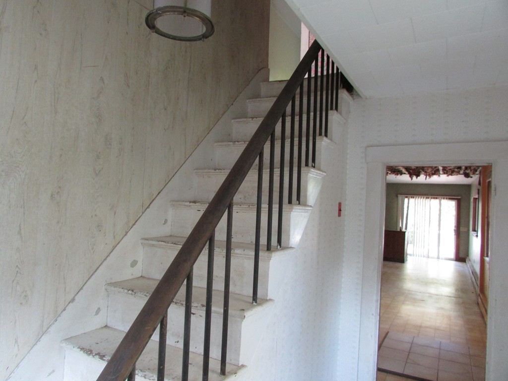 60 Brookfield Road Charlton, MA 01507 - Photo 11 of 14 a view of staircase with wooden floor and fan