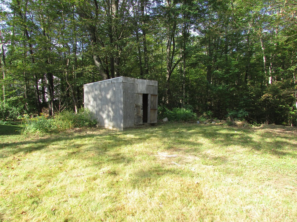 60 Brookfield Road Charlton, MA 01507 - Photo 3 of 14 a view of a backyard